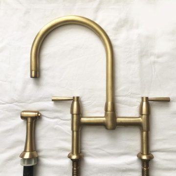 PERRIN & ROWE - Io two hole bench mounted mixer with metal levers round spout & spray rinse in satin brass NZ196